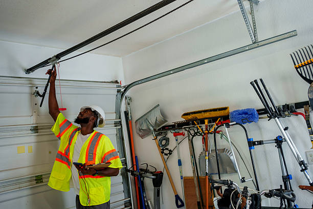 Professional Garage Door Panel Replacement technician working in Simpson, PA